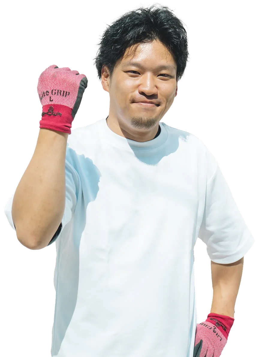 片付けをサポートするスタッフの写真